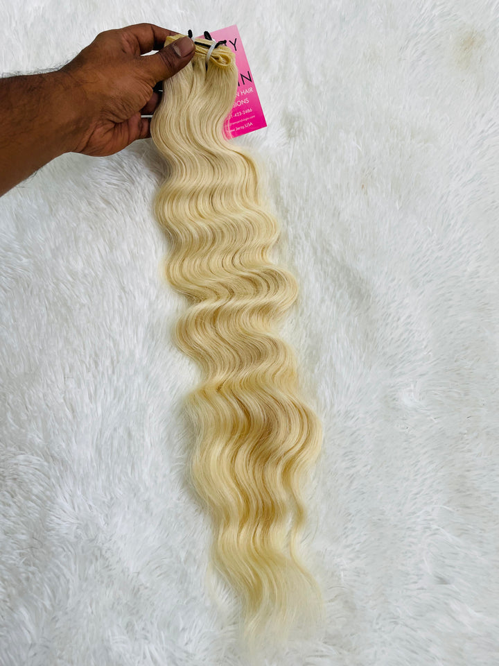 Pelo rubio indio crudo ondulado