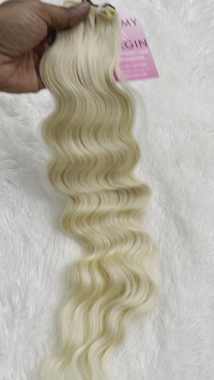 Pelo rubio indio crudo ondulado