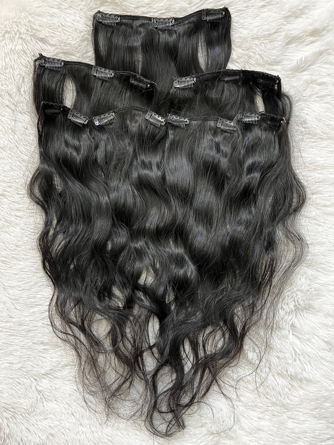 Clip-ins ondulados indios crudos